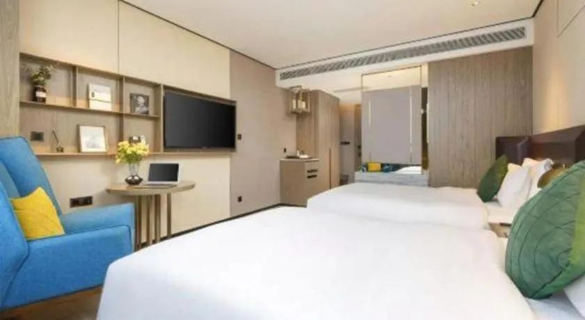 Bed in Echarm Plus Hotel Hangzhou Binjiang Xingguang Avenue