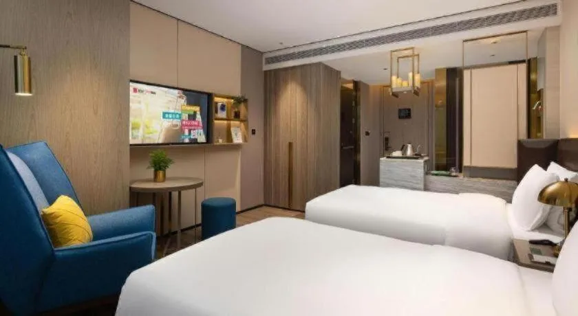 Bed in Echarm Plus Hotel Hangzhou Binjiang Xingguang Avenue