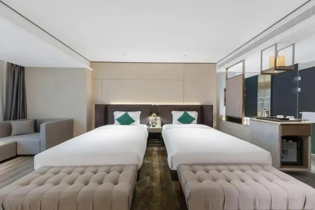 Bed in Echarm Plus Hotel Hangzhou Binjiang Xingguang Avenue