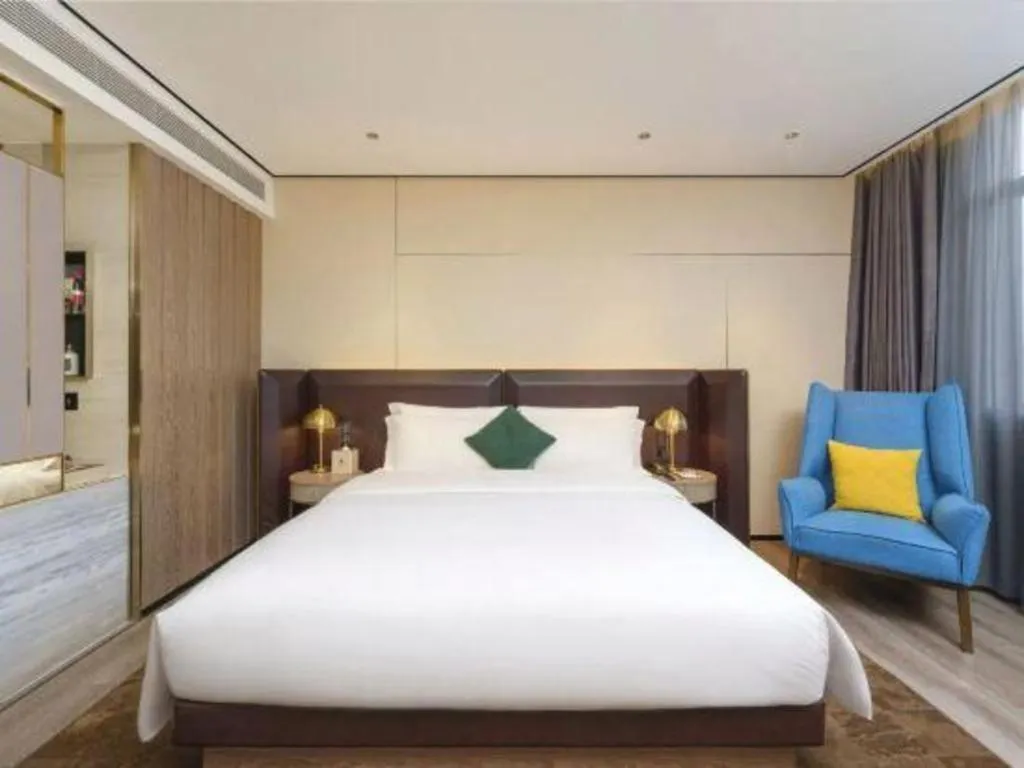 Bed in Echarm Plus Hotel Hangzhou Binjiang Xingguang Avenue