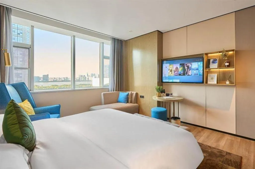 Bed in Echarm Plus Hotel Hangzhou Binjiang Xingguang Avenue