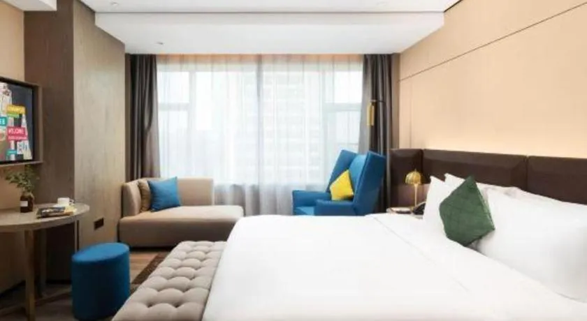 Bed in Echarm Plus Hotel Hangzhou Binjiang Xingguang Avenue