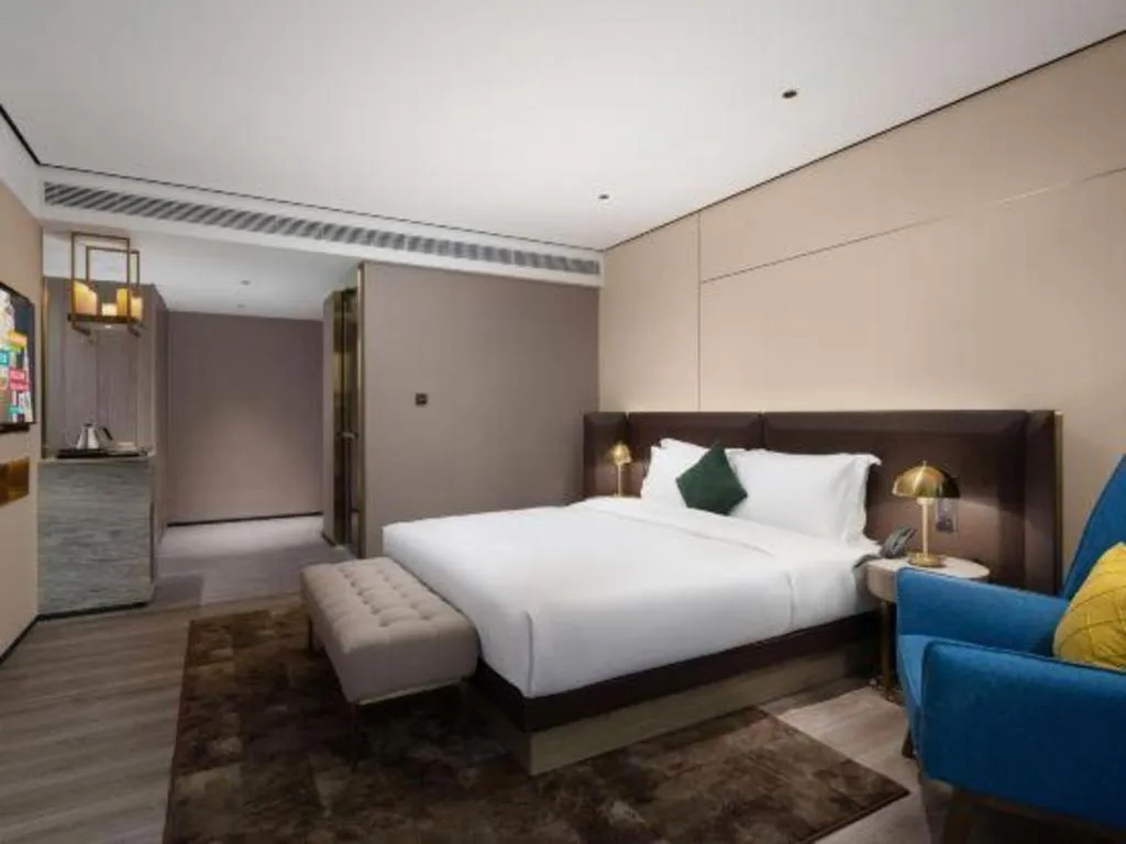 Bed in Echarm Plus Hotel Hangzhou Binjiang Xingguang Avenue