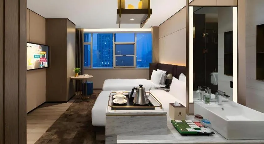 Bed in Echarm Plus Hotel Hangzhou Binjiang Xingguang Avenue