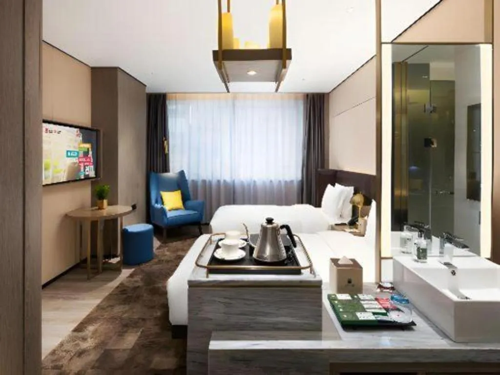 Bed in Echarm Plus Hotel Hangzhou Binjiang Xingguang Avenue