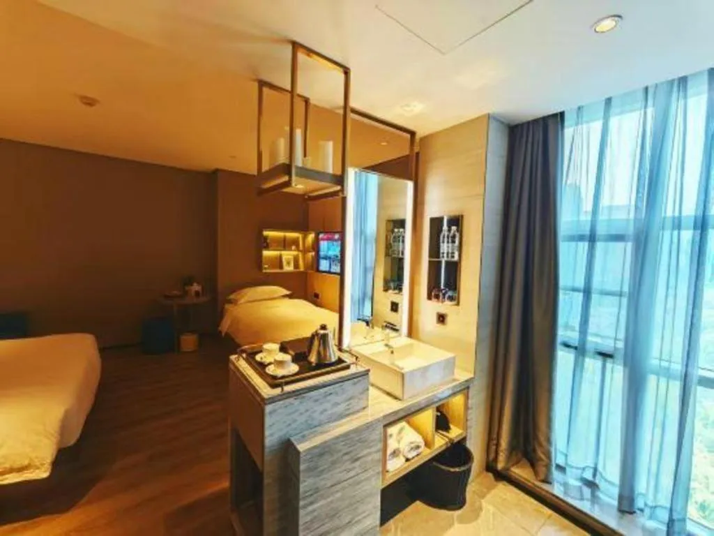 Bed in Echarm Plus Hotel Hangzhou Binjiang Xingguang Avenue