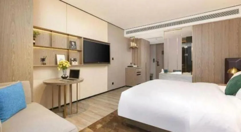 Bed in Echarm Plus Hotel Hangzhou Binjiang Xingguang Avenue