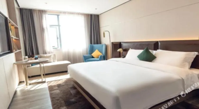 Bed in Echarm Plus Hotel Hangzhou Binjiang Xingguang Avenue