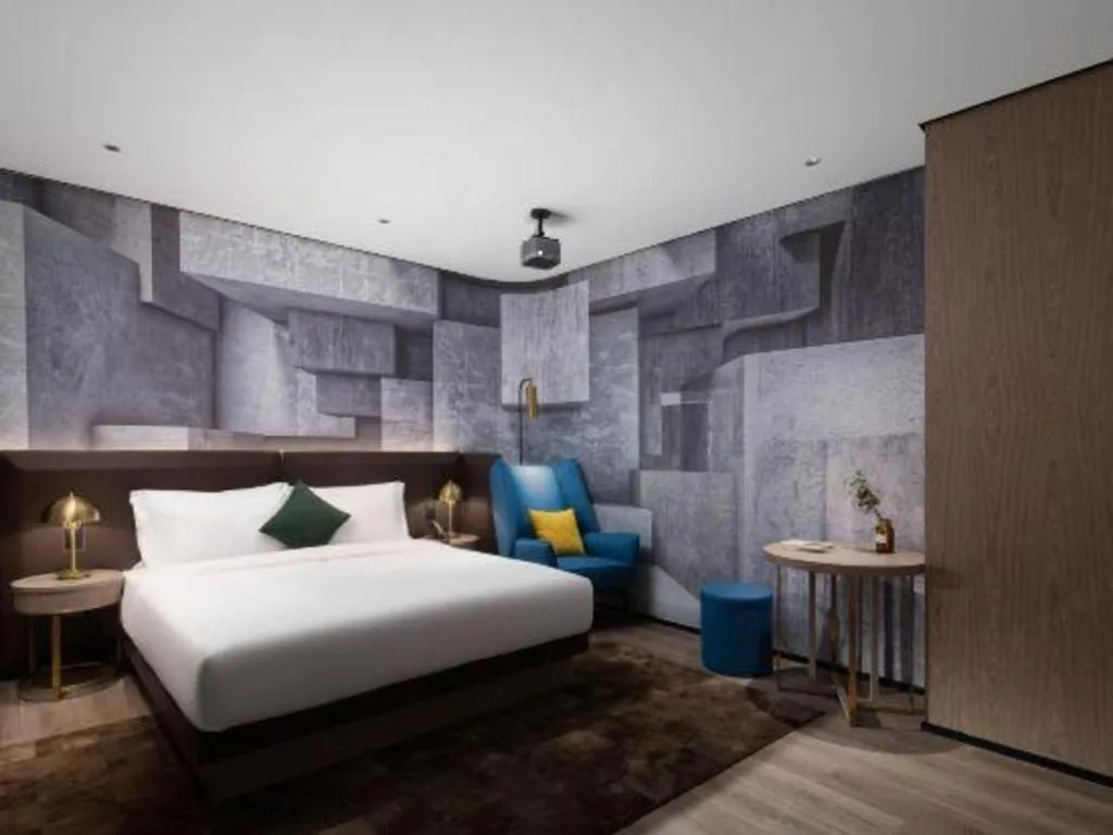 Bed in Echarm Plus Hotel Hangzhou Binjiang Xingguang Avenue