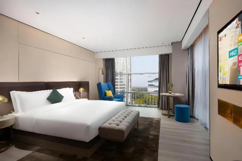Bed in Echarm Plus Hotel Hangzhou Binjiang Xingguang Avenue