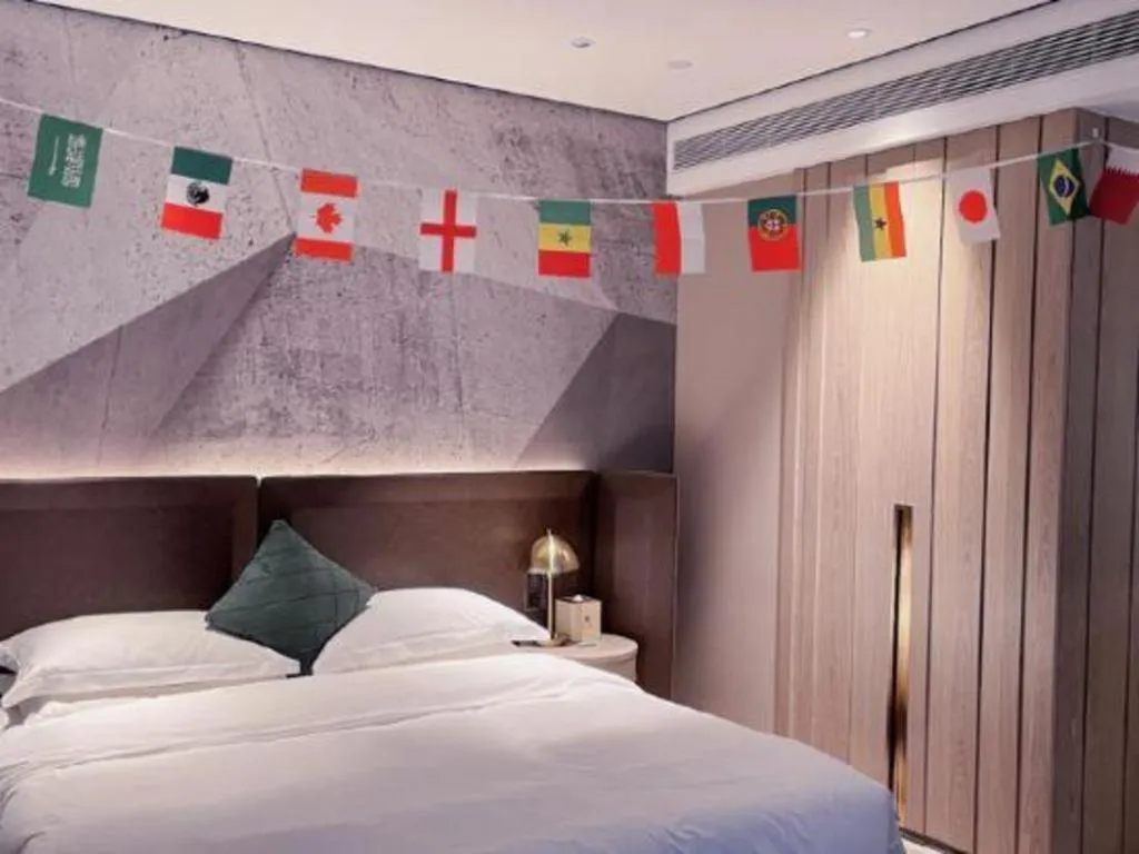 Bed in Echarm Plus Hotel Hangzhou Binjiang Xingguang Avenue