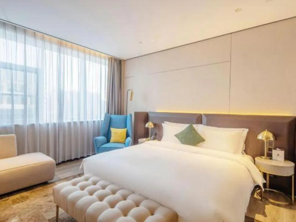 Bed in Echarm Plus Hotel Hangzhou Binjiang Xingguang Avenue