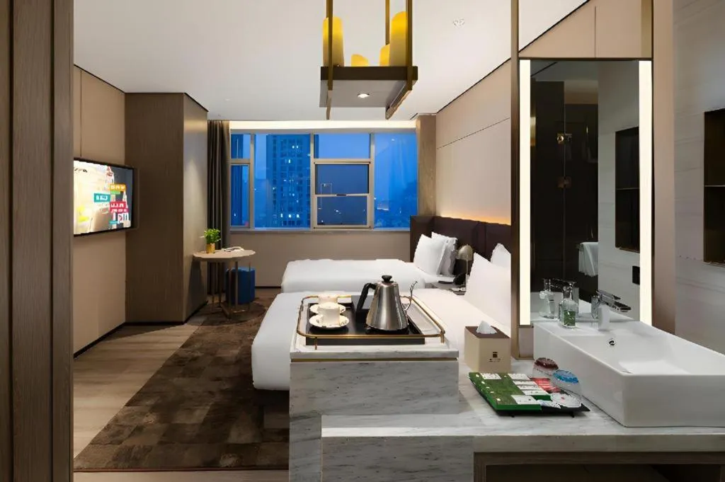 Bed in Echarm Plus Hotel Hangzhou Binjiang Xingguang Avenue