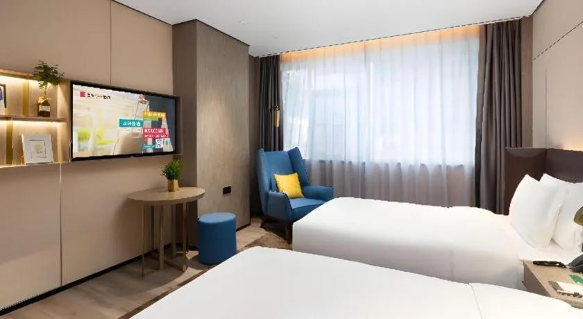 Bed in Echarm Plus Hotel Hangzhou Binjiang Xingguang Avenue