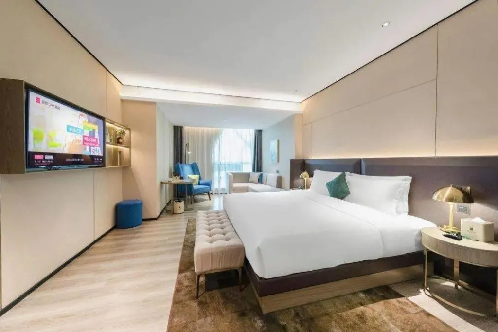 Bed in Echarm Plus Hotel Hangzhou Binjiang Xingguang Avenue
