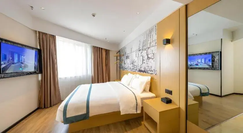 Bed in City Comfort Inn Shannan Passenger Terminal Bed in City Comfort Inn Shannan Passenger Terminal