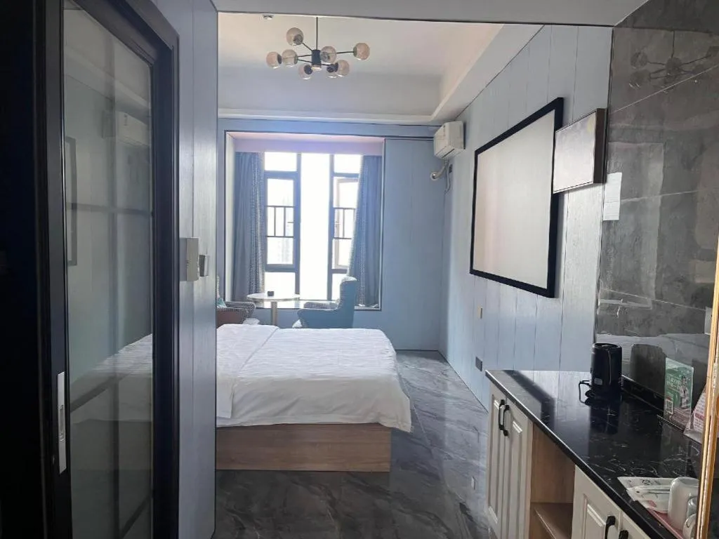 Bed in Echarm Hotel Changsha South High-Speed Railway Station Wuyue Plaza