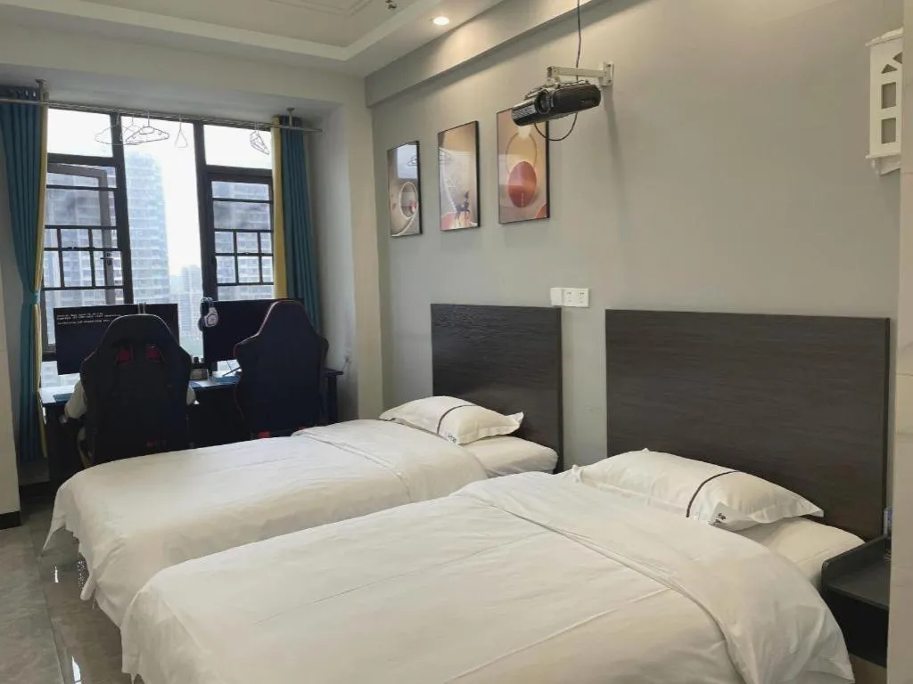 Bed in Echarm Hotel Changsha South High-Speed Railway Station Wuyue Plaza