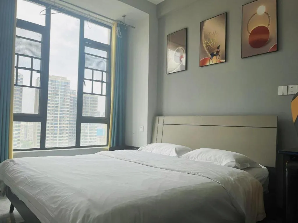 Bed in Echarm Hotel Changsha South High-Speed Railway Station Wuyue Plaza