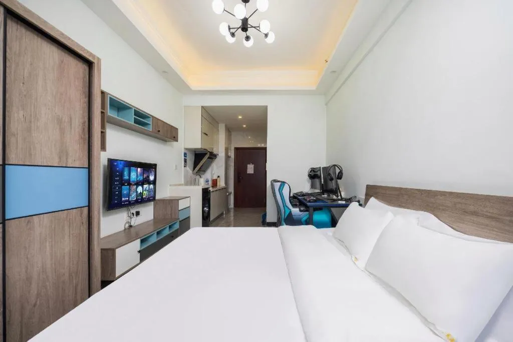 Bed in Echarm Hotel Changsha South High-Speed Railway Station Wuyue Plaza