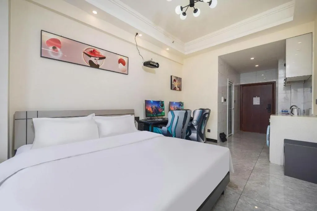 Bed in Echarm Hotel Changsha South High-Speed Railway Station Wuyue Plaza