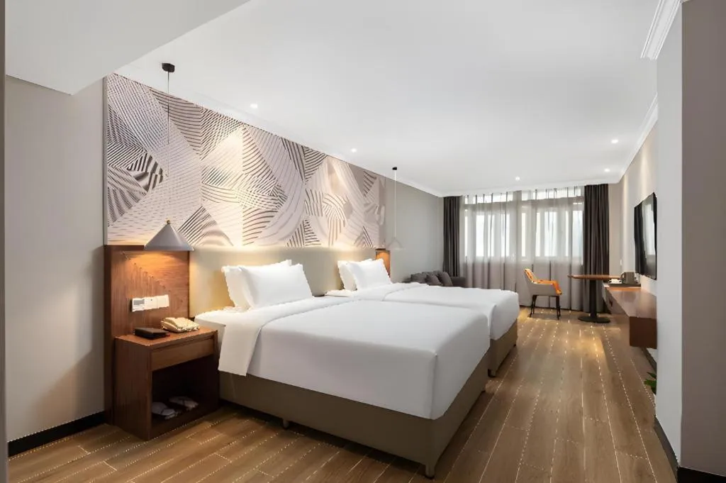 Bed in Borrman Hotel Chongqing Hechuan High-speed Railway Station District Government