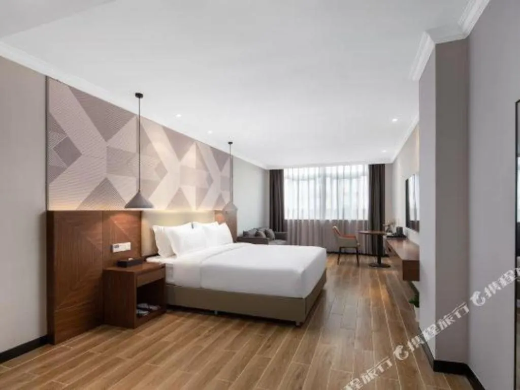 Bed in Borrman Hotel Chongqing Hechuan High-speed Railway Station District Government