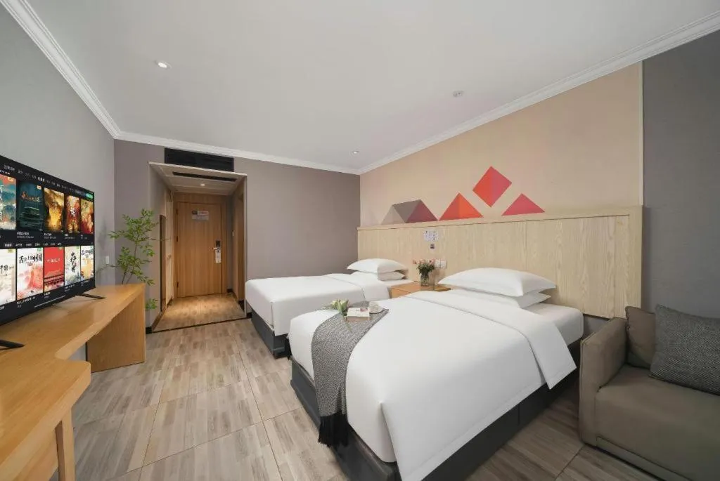 Bed in Borrman Hotel Chongqing Hechuan High-speed Railway Station District Government