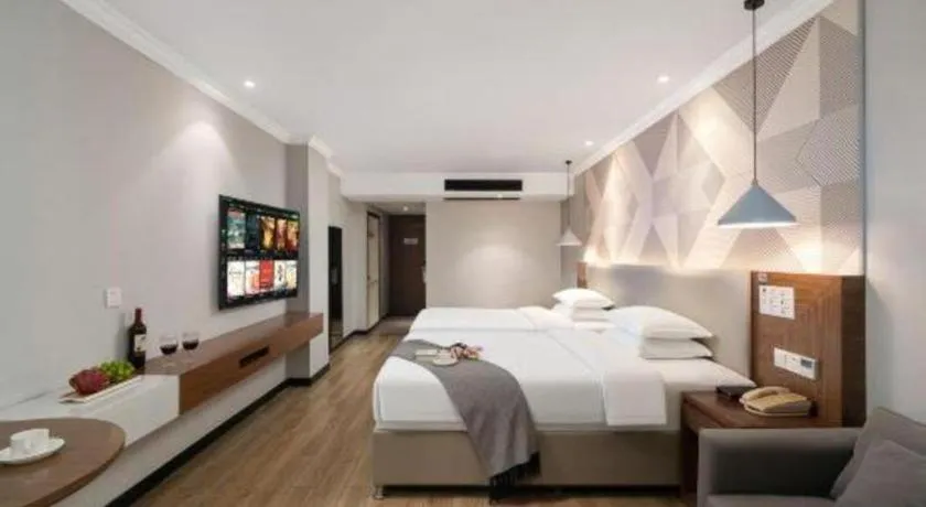 Bed in Borrman Hotel Chongqing Hechuan High-speed Railway Station District Government