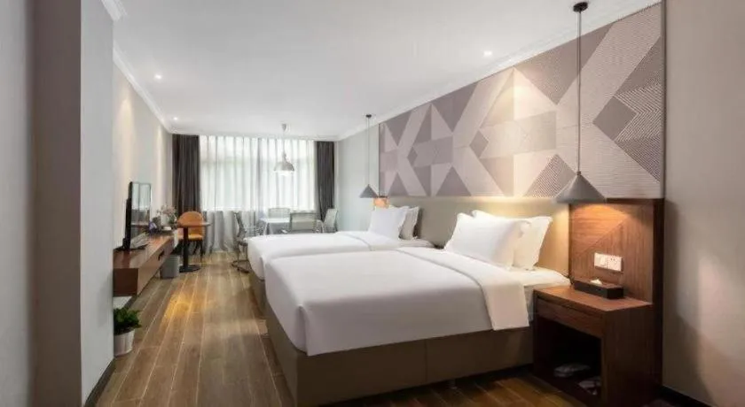 Bed in Borrman Hotel Chongqing Hechuan High-speed Railway Station District Government