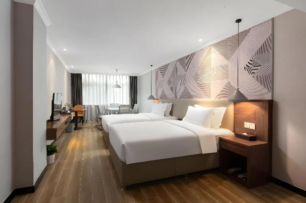 Bed in Borrman Hotel Chongqing Hechuan High-speed Railway Station District Government