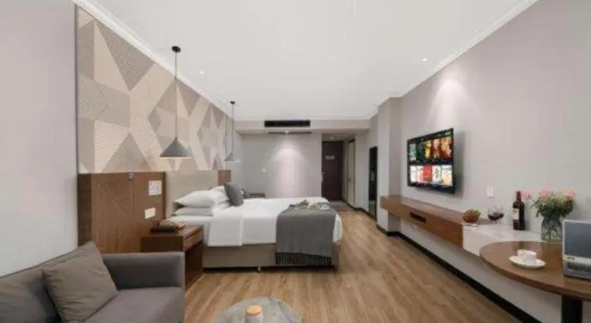 Bed in Borrman Hotel Chongqing Hechuan High-speed Railway Station District Government