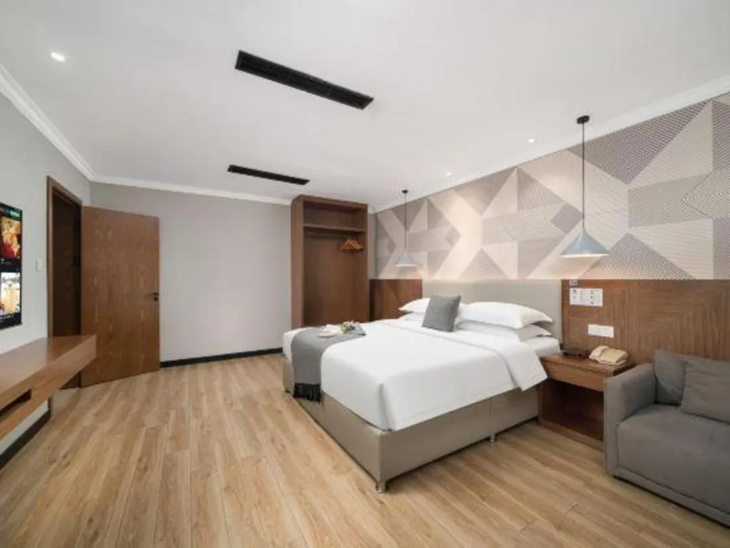 Bed in Borrman Hotel Chongqing Hechuan High-speed Railway Station District Government