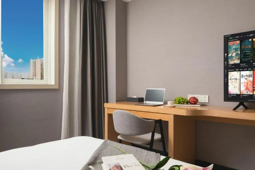 Bed in Borrman Hotel Chongqing Hechuan High-speed Railway Station District Government