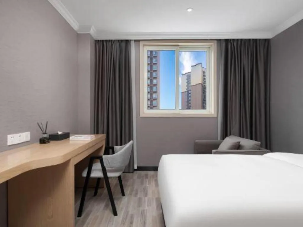 Bed in Borrman Hotel Chongqing Hechuan High-speed Railway Station District Government