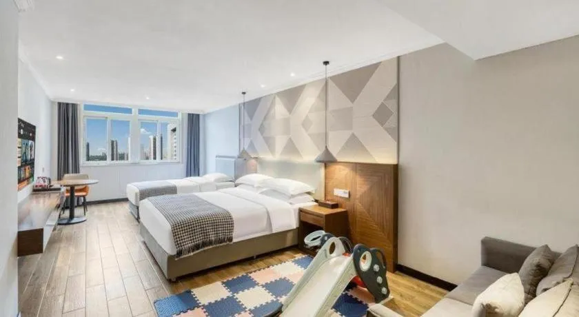 Bed in Borrman Hotel Chongqing Hechuan High-speed Railway Station District Government