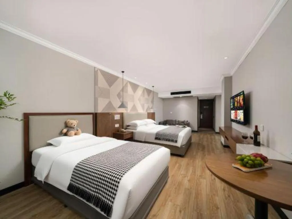 Bed in Borrman Hotel Chongqing Hechuan High-speed Railway Station District Government