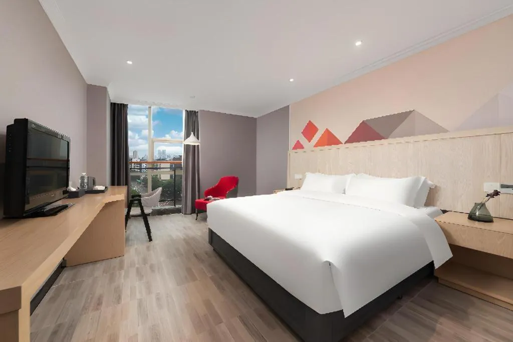 Bed in Borrman Hotel Chongqing Hechuan High-speed Railway Station District Government