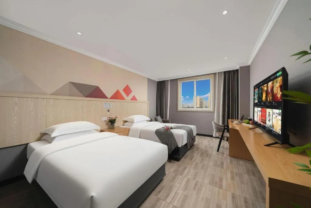 Bed in Borrman Hotel Chongqing Hechuan High-speed Railway Station District Government