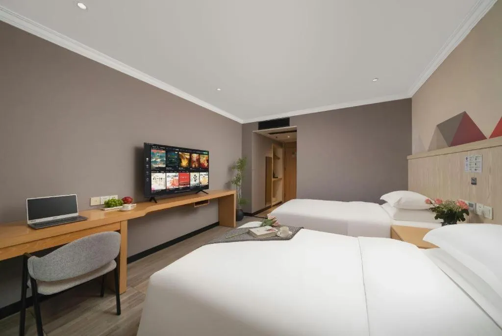 Bed in Borrman Hotel Chongqing Hechuan High-speed Railway Station District Government