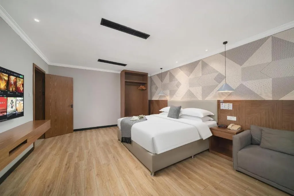 Bed in Borrman Hotel Chongqing Hechuan High-speed Railway Station District Government