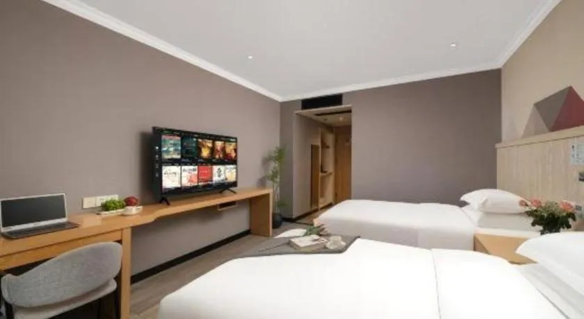 Bed in Borrman Hotel Chongqing Hechuan High-speed Railway Station District Government