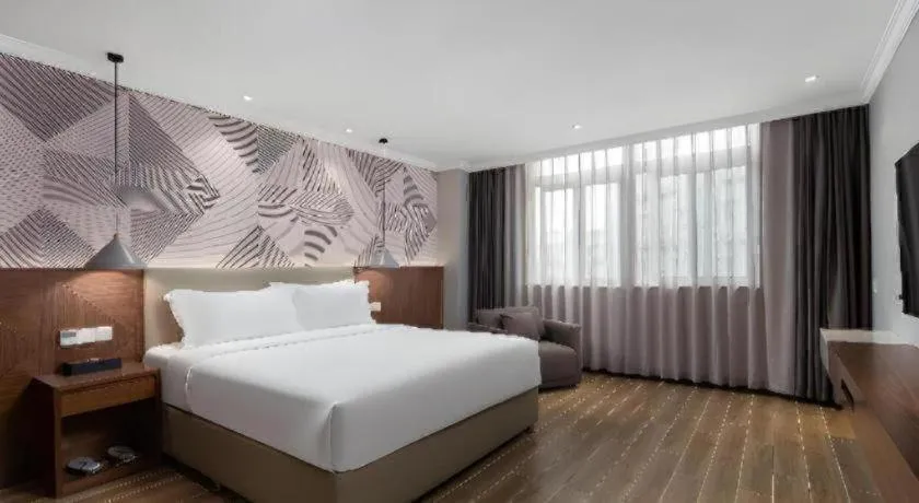 Bed in Borrman Hotel Chongqing Hechuan High-speed Railway Station District Government