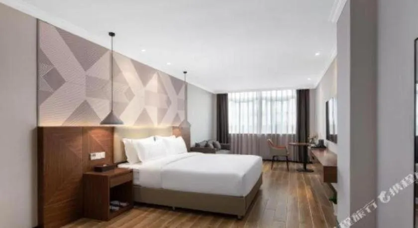 Bed in Borrman Hotel Chongqing Hechuan High-speed Railway Station District Government