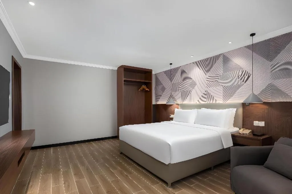 Bed in Borrman Hotel Chongqing Hechuan High-speed Railway Station District Government