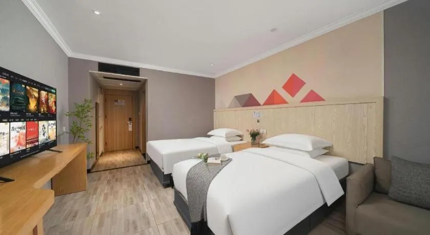 Bed in Borrman Hotel Chongqing Hechuan High-speed Railway Station District Government