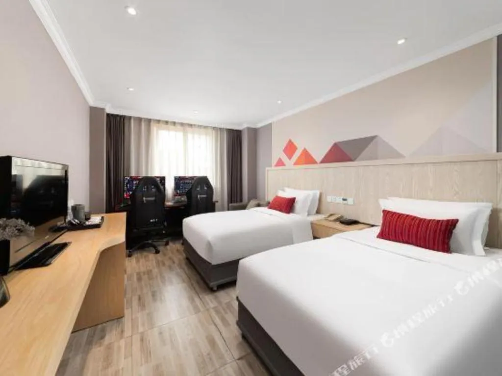 Bed in Borrman Hotel Chongqing Hechuan High-speed Railway Station District Government