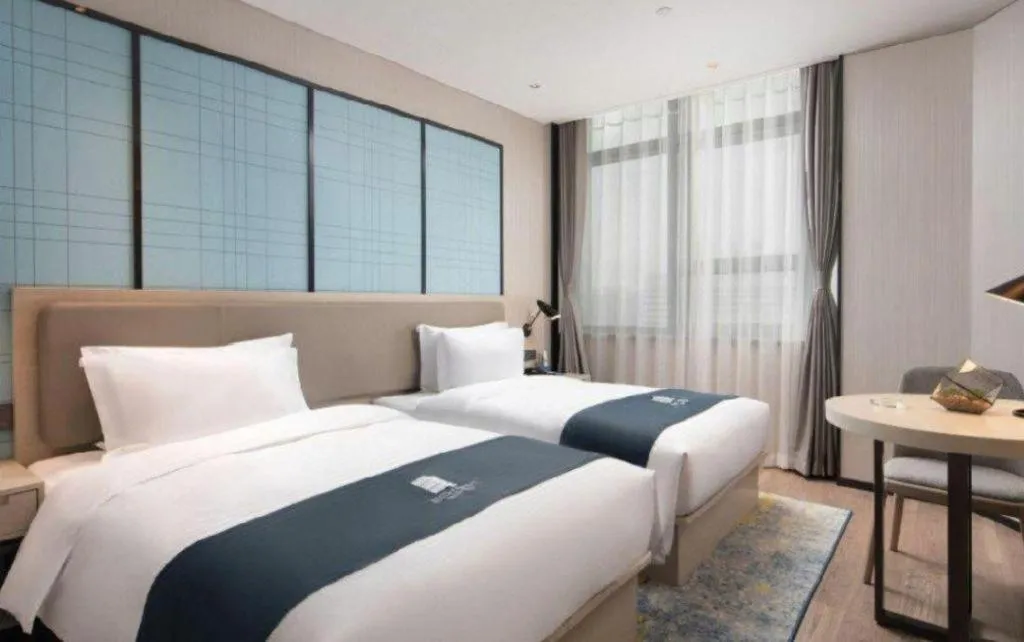 Bed in Echarm Hotel Hengshui 2nd High School High-speed Railway Station