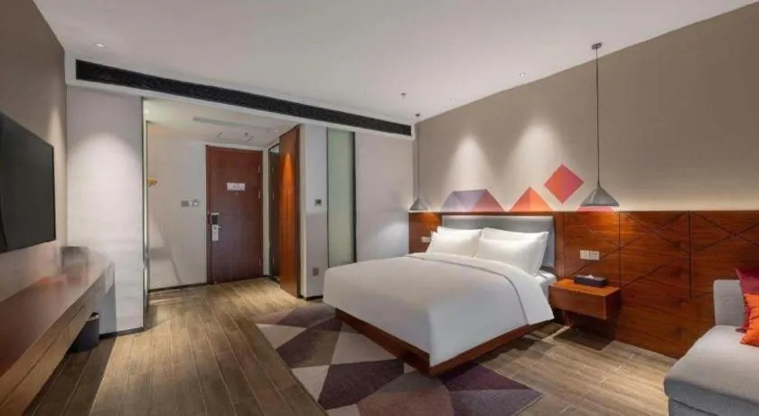 Bed in Borrman Hotel Guilin North Railway Station Zhonghao International