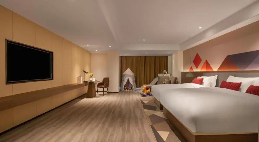 Bed in Borrman Hotel Guilin North Railway Station Zhonghao International